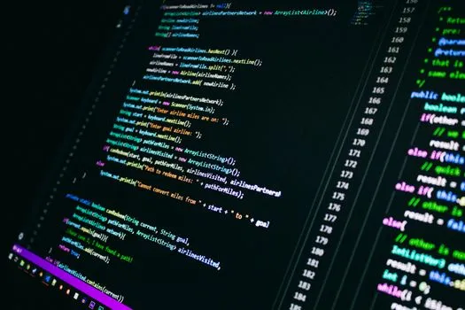 Developers and designers collaborating on open source software